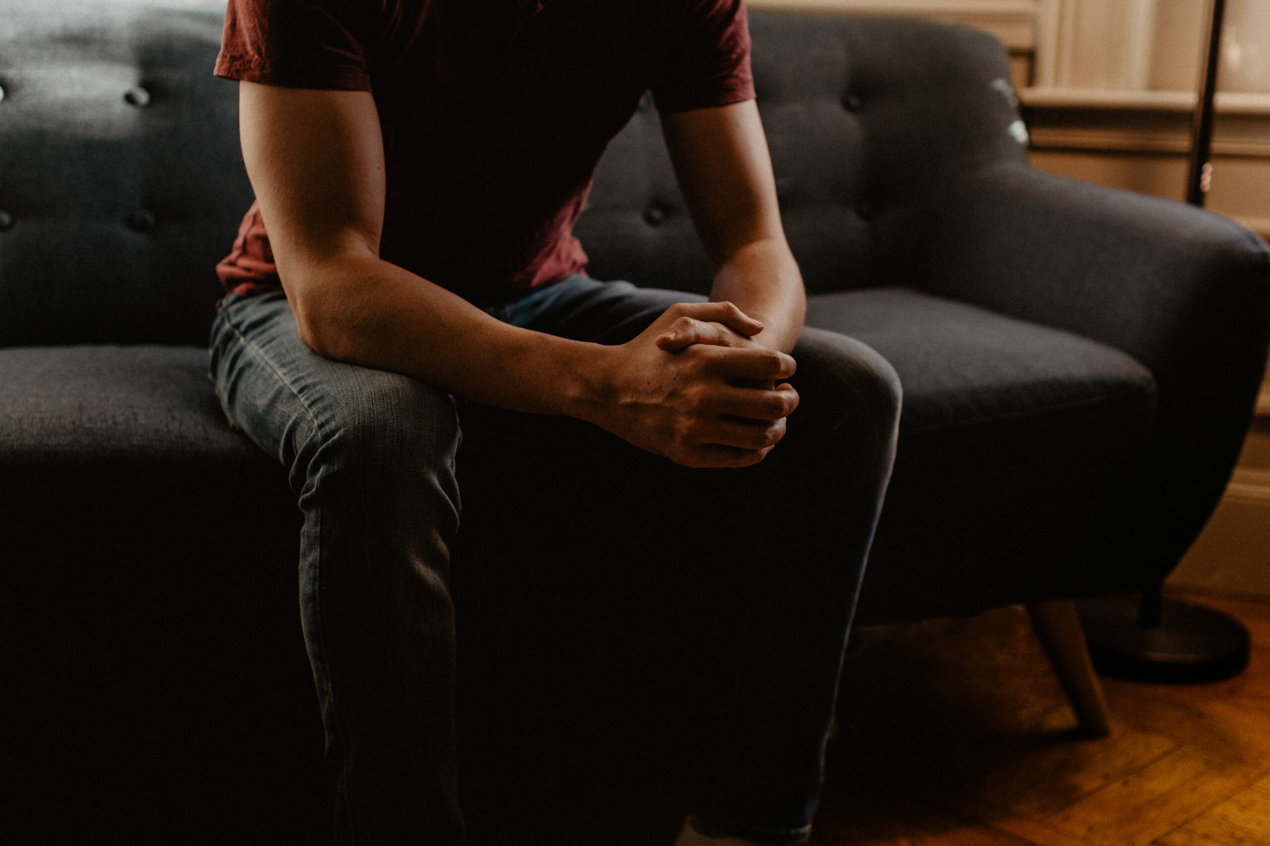 an image of a person dealing with substance abuse and social isolation