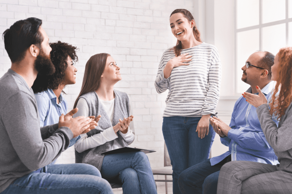 woman in rehab meeting | Gratitude Lodge