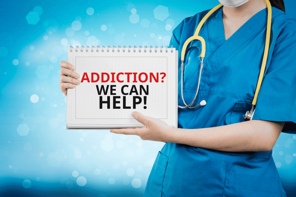 An image of a nurse holding a notebook that reads, "Addiction? We can help!"