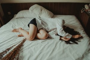 A woman distressed, symbolizing the dangers of cocaine and pregnancy
