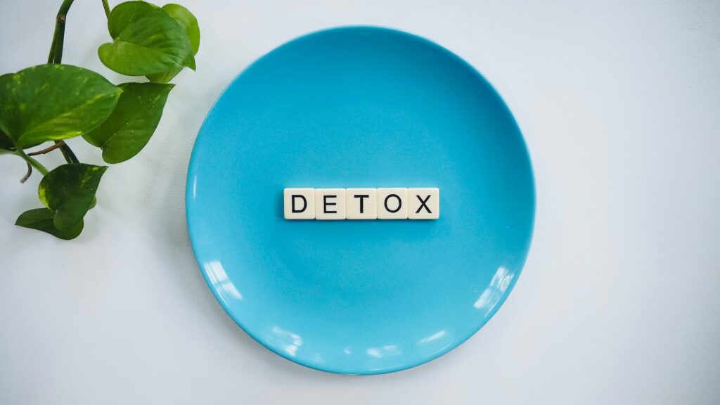 An image of game tiles spelling "detox"