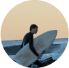 An image of a man surfing to stay sober