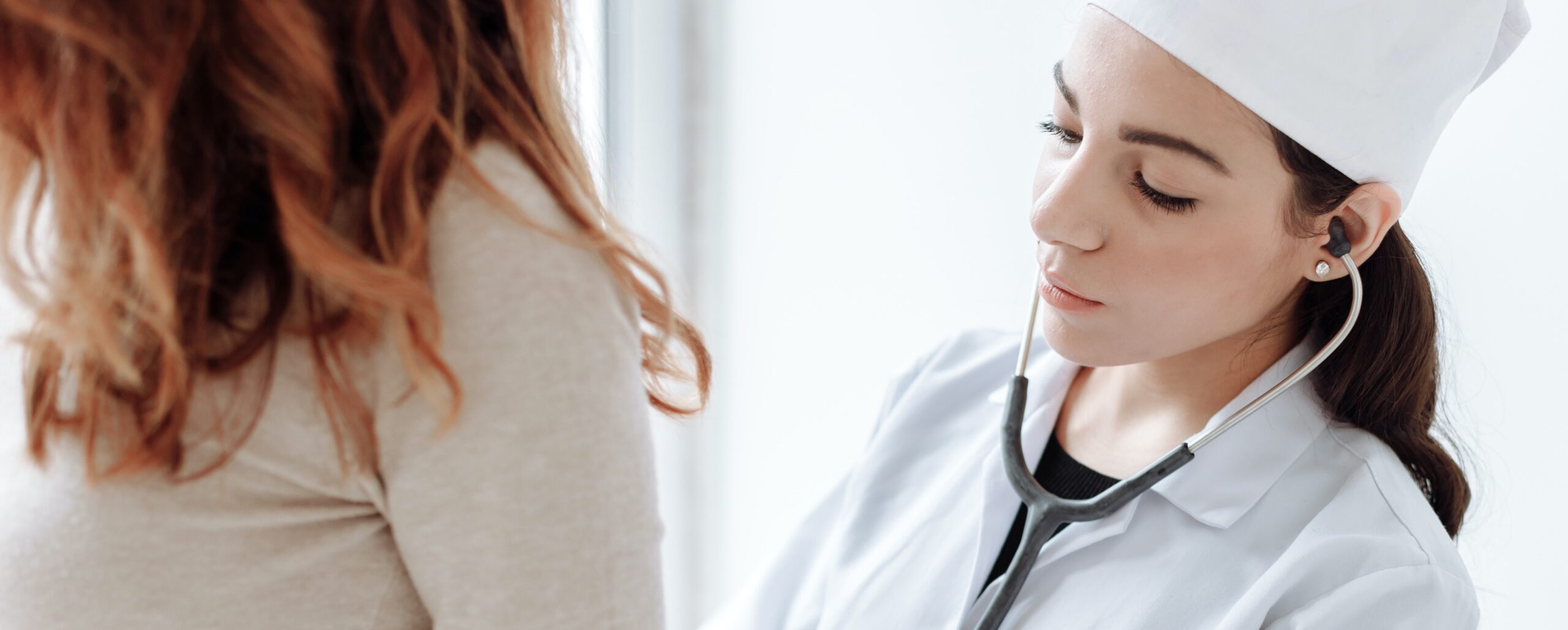 A doctor is treating a patient to represent using Lucemyra for withdrawal syptoms in addiction recovery.