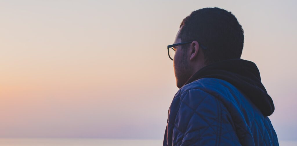A man looks out at the ocean representing is clonazepam addictive