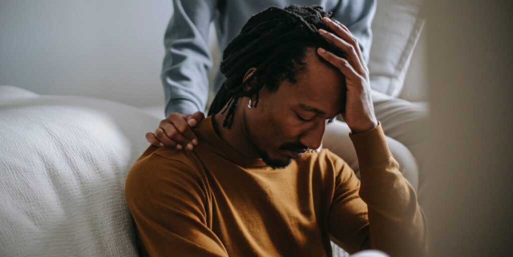 image of man representing how long does alcohol poisoning stay.