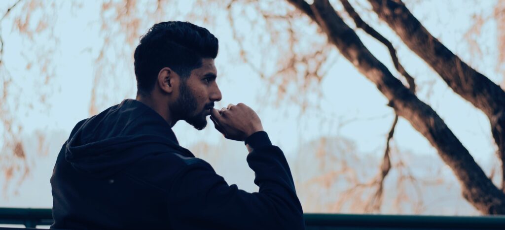Man deep in thought representing half life of drugs.