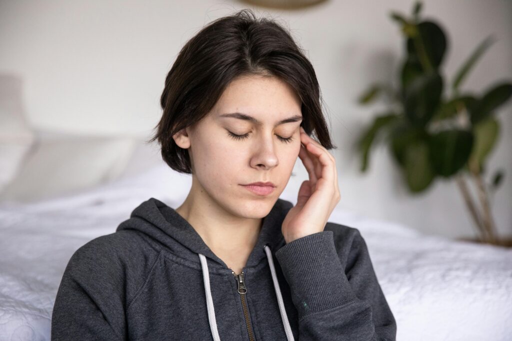 An image of a woman in distress, symbolizing potential signs of meth use