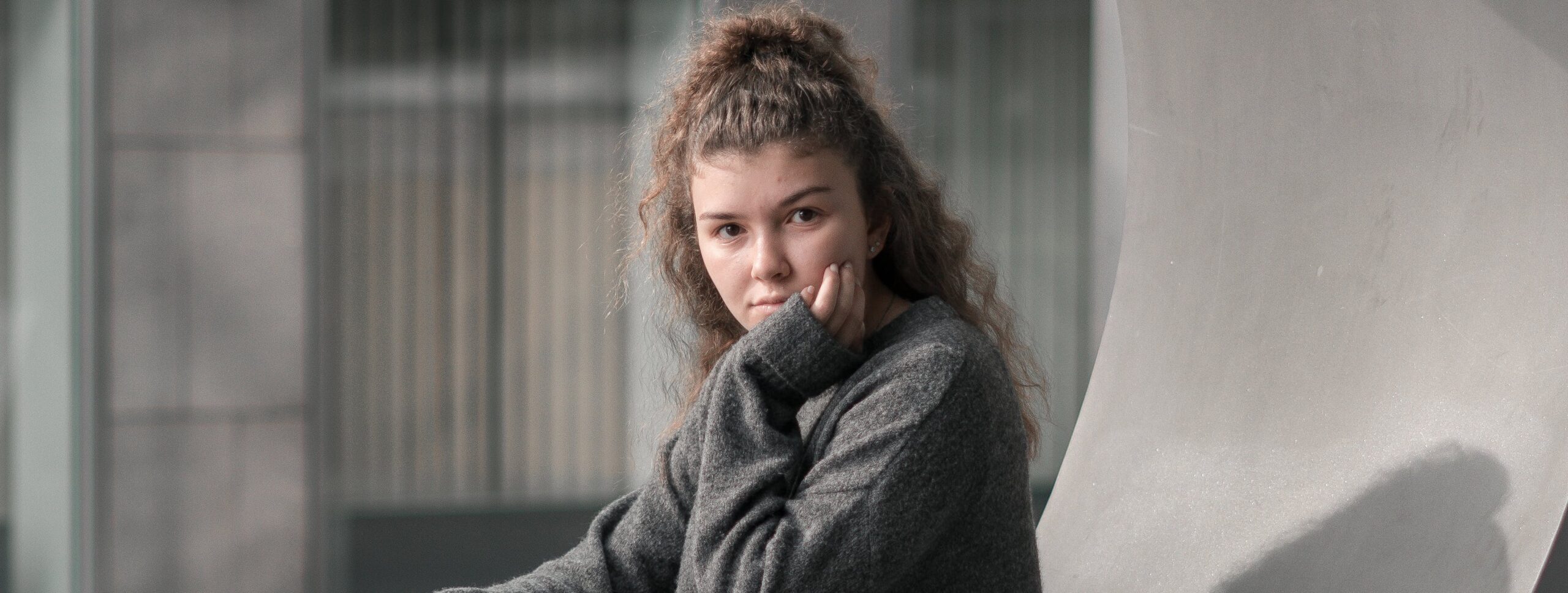 woman deep in thought representing signs of fentanyl use