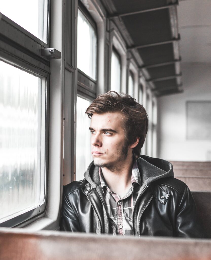 A man stares out the window wondering: how long does ketamine stay in your system?