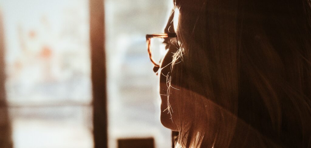 woman looking away representing symptoms of meth use