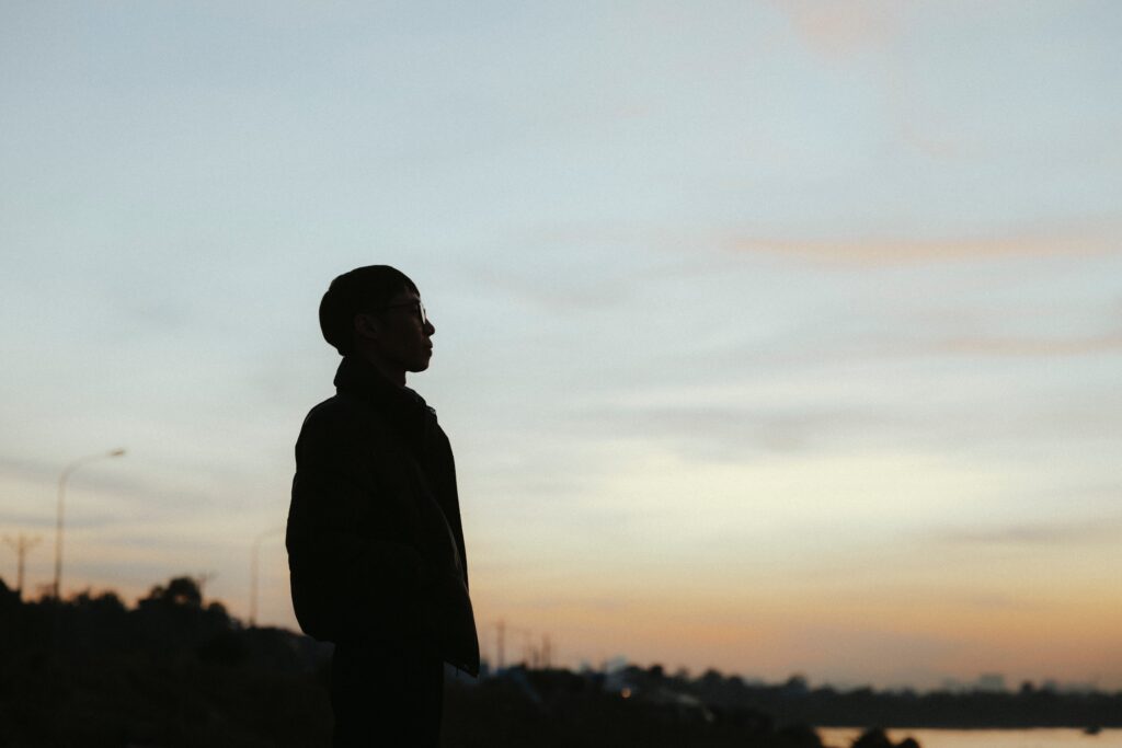 Someone watching the sunset thinking about the side effects of alcohol and prednisone