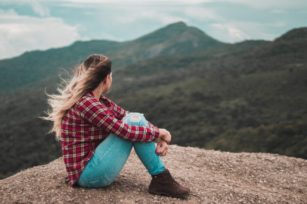 A woman on a hike thinking about Side effects of cocaine