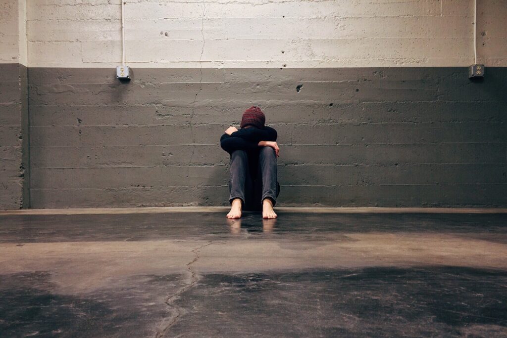 A man suffers from heroin withdrawal