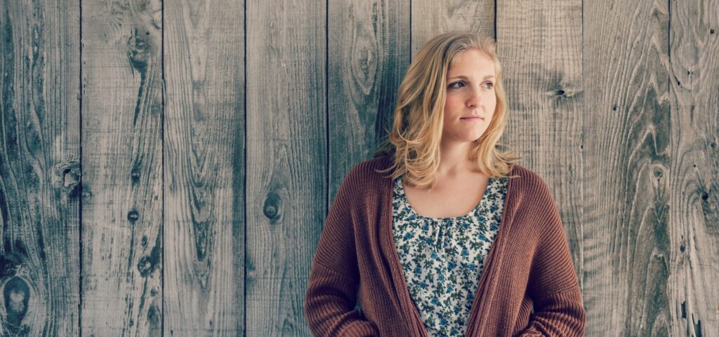 A woman in thought about Benzodiazepine FAQs