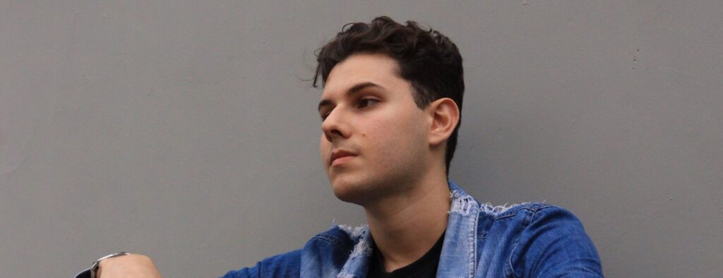 A man appears in thought, as he considers Drug-induced schizophrenia symptoms