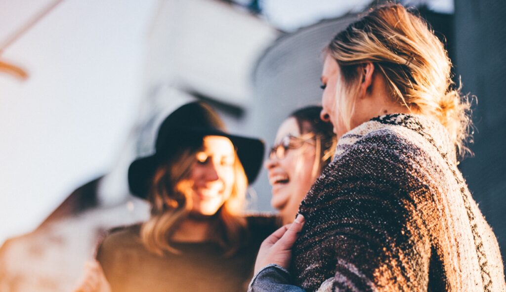 group of friends laughing representing Inpatient mental health facilities
