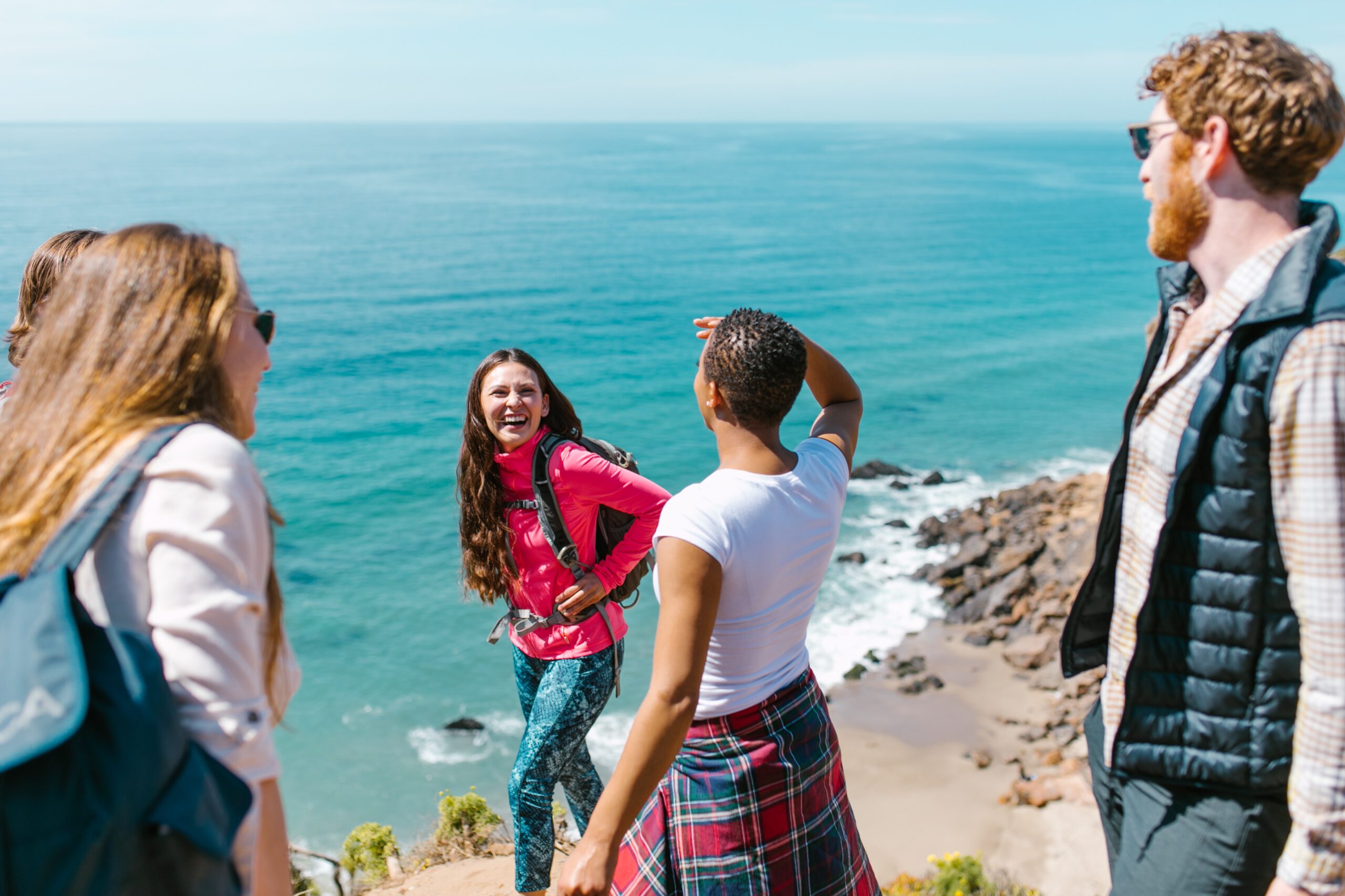 people laughing together representing What caused the opioid epidemic