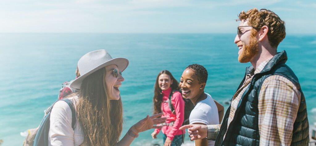 people laughing together representing What caused the opioid epidemic