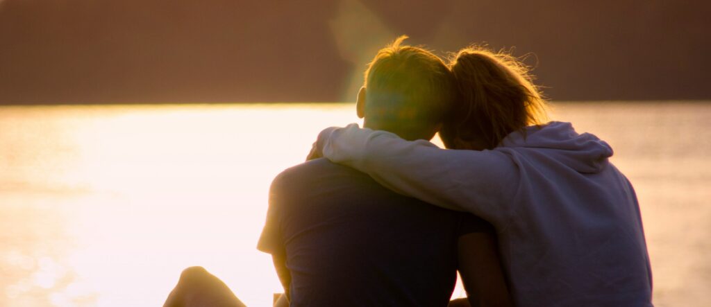 mother and son hugging representing My son is on drugs how can i help him
